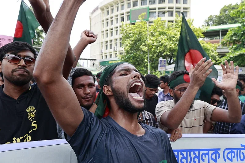 A protester chants slogan at Shahbagh intersection in Dhaka on 10 July 2024